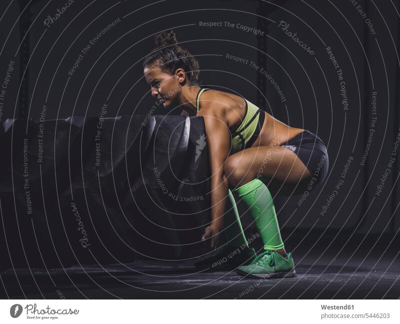 Athletic woman skipping with jumping rope in gym - a Royalty Free Stock  Photo from Photocase