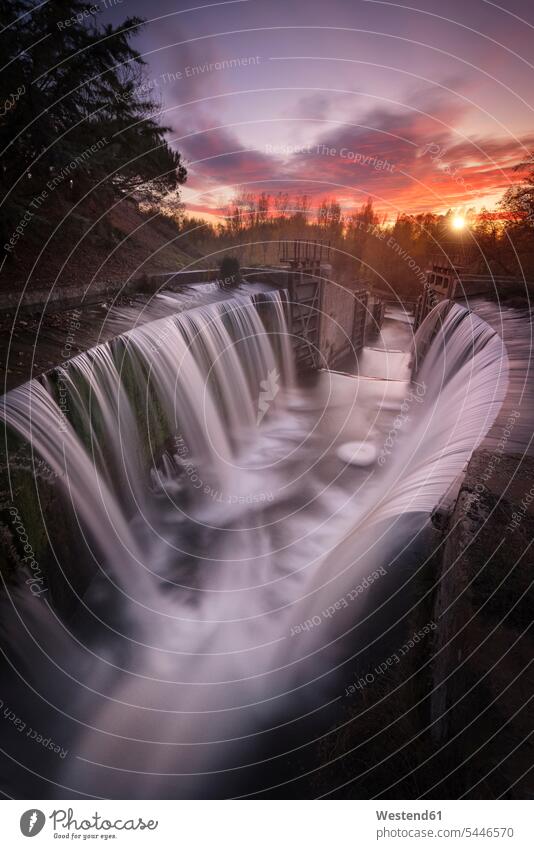 Spain, Palencia, Canal de Castilla, waterfall, long exposure of waterfall at sunset evening light flowing nature natural world waterfalls sunsets sundown