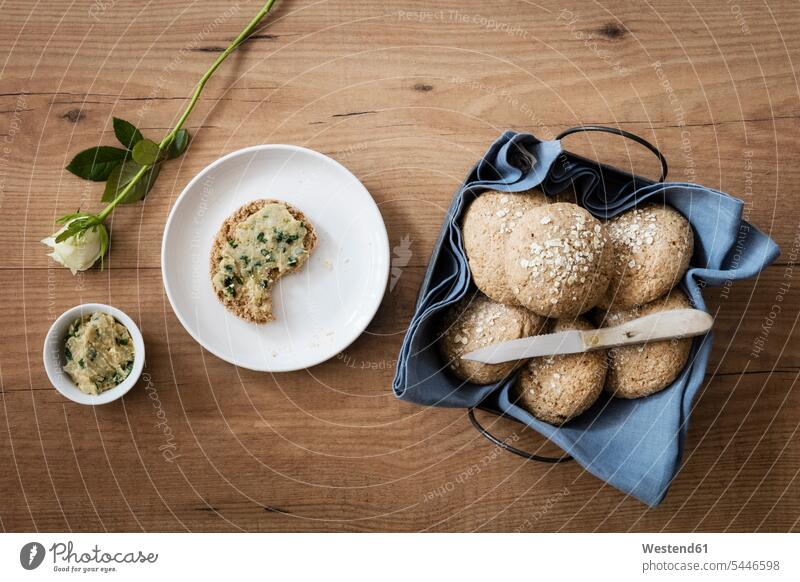 Homemade oat rolls with compound butter and a rose Plate dish dishes Plates overhead view from above top view Overhead Overhead Shot View From Above Oat