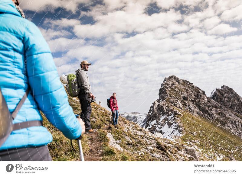 Germany, Bavaria, Oberstdorf, hikers in alpine scenery hiking mountain range mountains mountain ranges landscape landscapes terrain friends mate nature