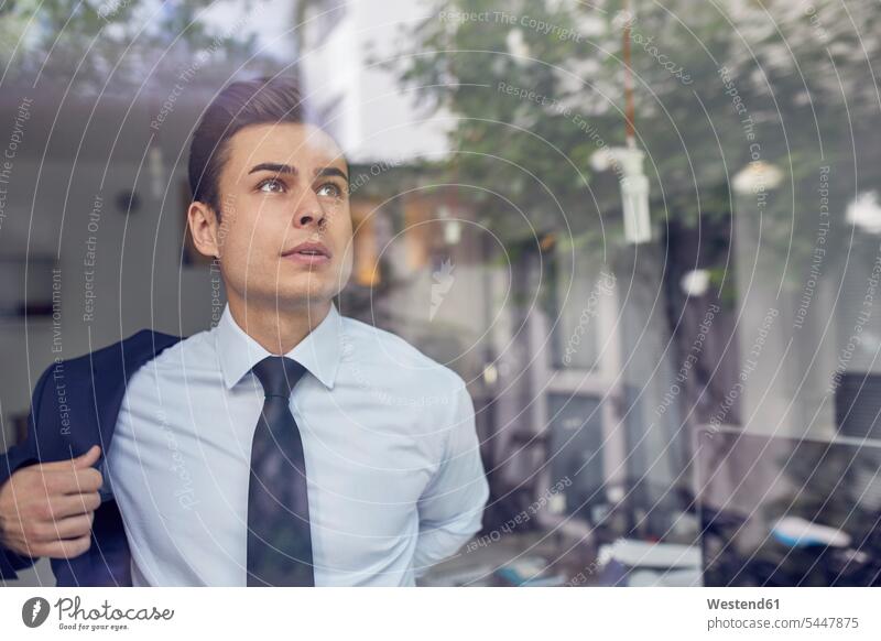 Young man at the window stock photo. Image of casual - 30207172