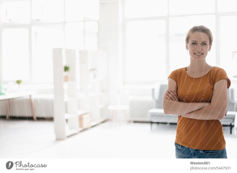 Portrait of woman in a loft lofts females women portrait portraits Adults grown-ups grownups adult people persons human being humans human beings spacious