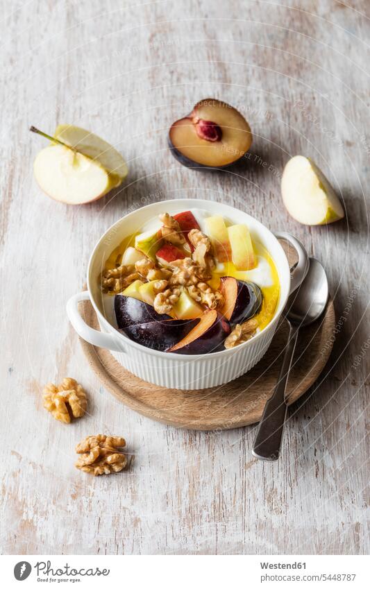 Curd with fruits, apple and plum, walnut and linseed oil Bowl Bowls morning break copy space Chopping Board Cutting Boards Chopping Boards healthy eating