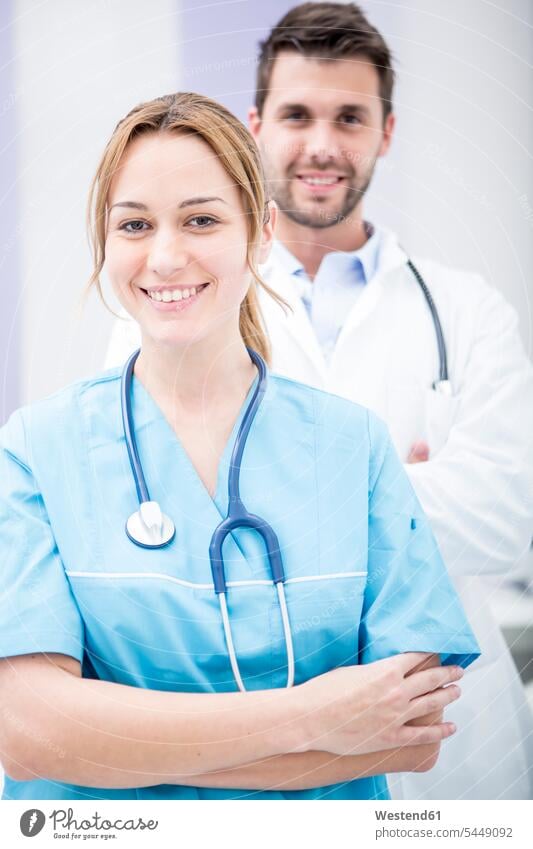 Portrait of two smiling doctors physicians portrait portraits smile Female Doctor Female Doctors healthcare and medicine medical Healthcare And Medicines