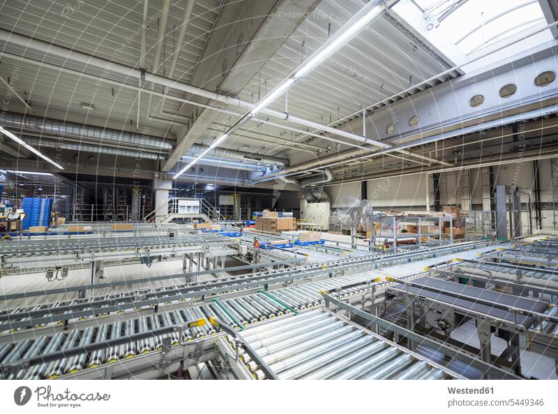 Conveyor belt in factory shop floor technology technologies engineering industry industrial automation industrial hall factory hall industrial buildings Job