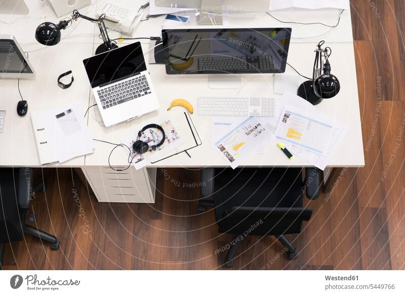 Desks with PCs in bright and modern open space office contemporary desktop PC personal computers desktop computer Desktop Computers accessibility accessible