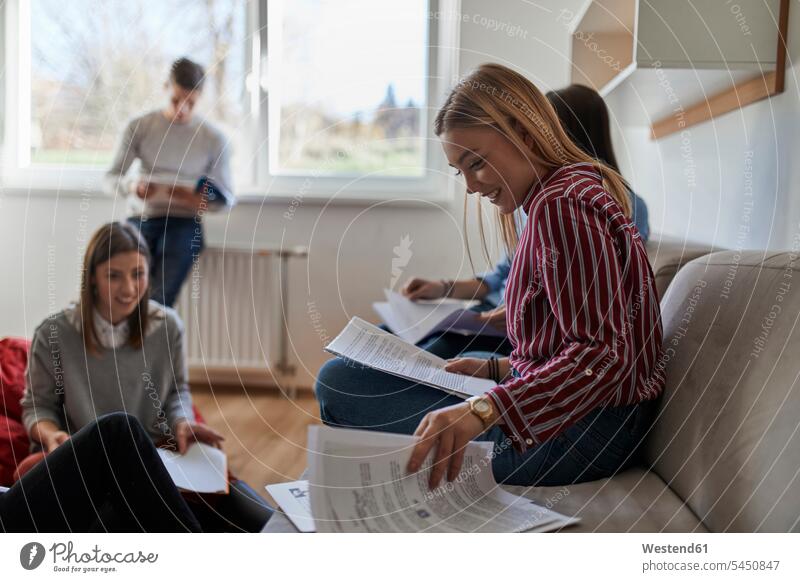 Group of students in dormitory learning together student accommodation dorms student dorm dormitories student dorms group of people groups of people persons