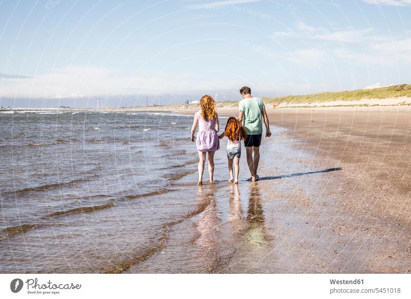 Netherlands, Zandvoort, family walking at the seashore beach beaches Sea ocean families going happiness happy water people persons human being humans