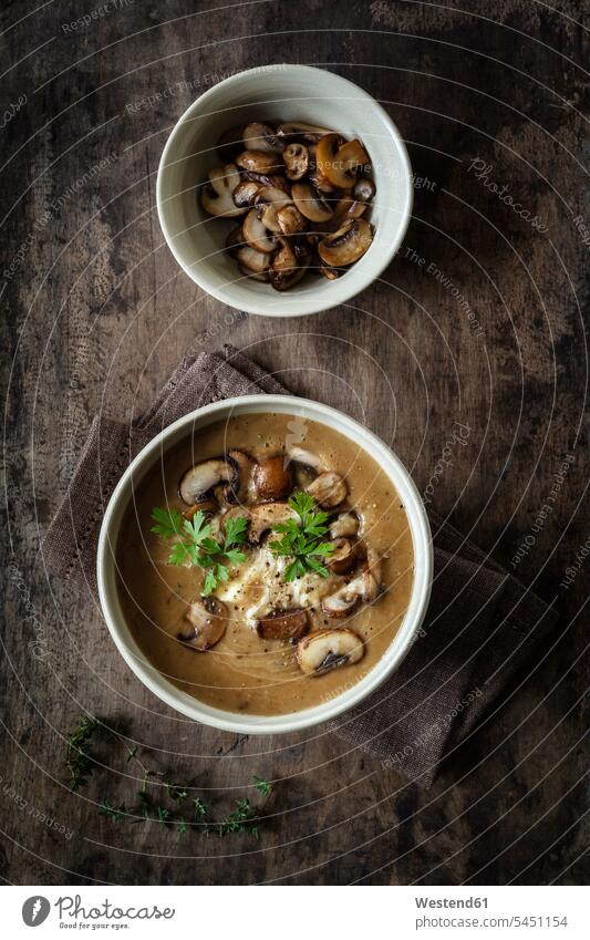 Sweet chestnut mushroom soup parsley Soup Soups Potage wooden Chestnut Chestnuts Aesculus hippocastanum overhead view from above top view Overhead Overhead Shot