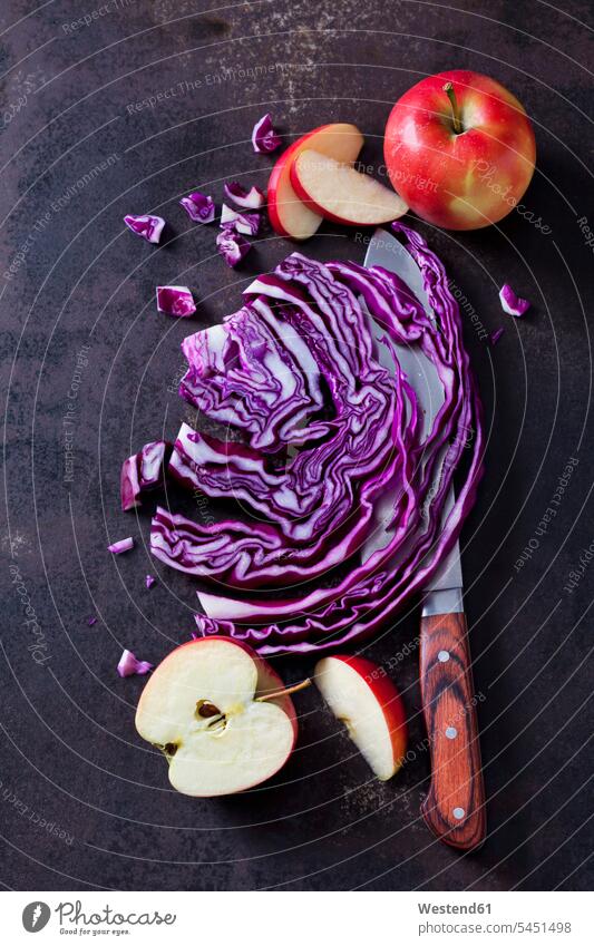 Sliced and red cabbage and apples on rusty ground nobody overhead view from above top view Overhead Overhead Shot View From Above Fruit Fruits red apple