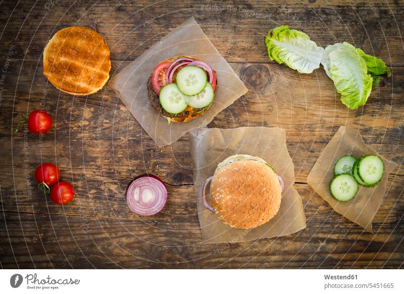 Homemade burger nobody preparation prepare preparing garnished lettuce leaf lettuce leaves Unhealthy Eating unhealthy sliced ready to eat ready-to-eat