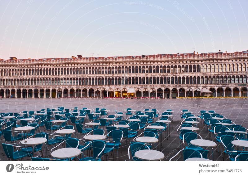 Italy, Venice, Empty St Mark's Square in the early morning landmark sight place of interest historic historical ancient Table Tables cafe chair chairs