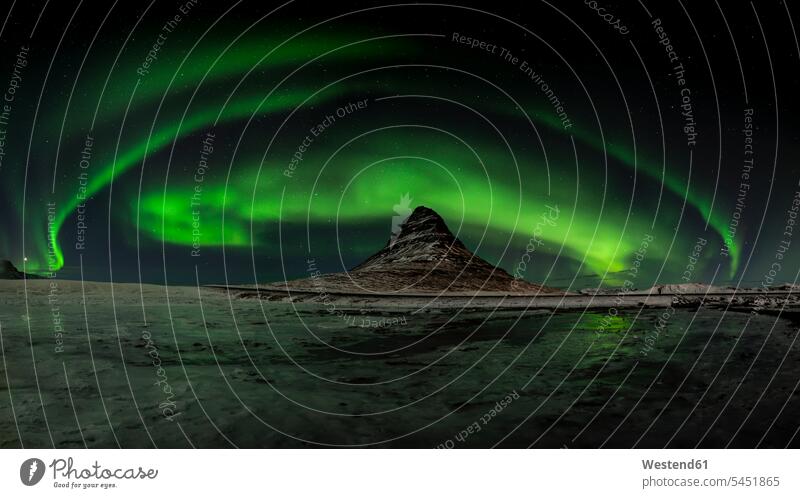 Iceland, Northen lights at Kirkjufell mountain beauty of nature beauty in nature brightness glare luminescent natural world Darkness mountains Aurora Borealis