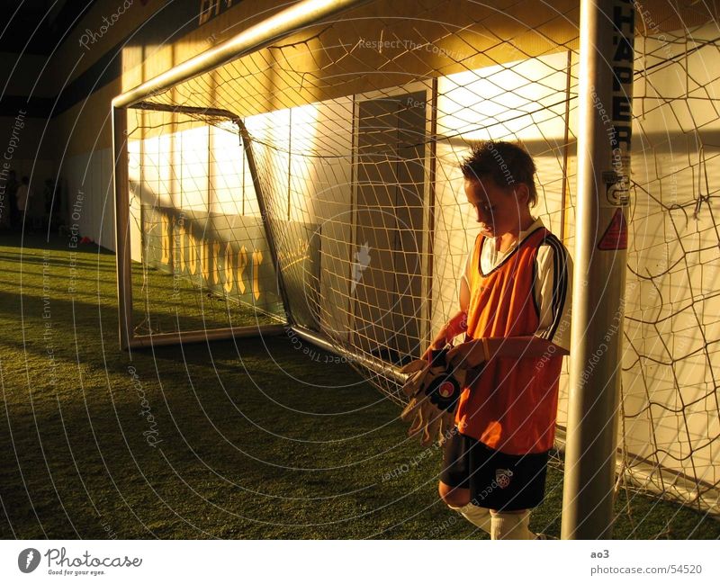 before the penalty shootout... Goalkeeper Gloves Hand Light Sunset Artificial lawn Jersey Red Yellow White Twilight Loneliness Meadow Green Soccer Goal