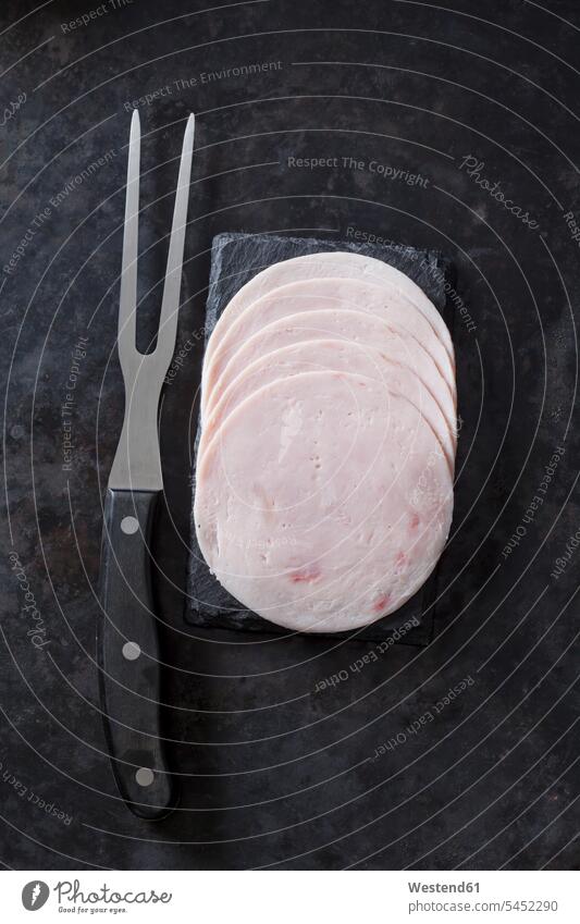 Sliced turkey sausage with meat fork overhead view from above top view Overhead Overhead Shot View From Above poultry sausage Slices Sausage Sausages Fork Forks