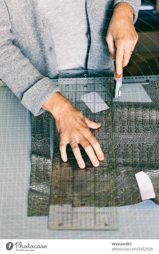 Close-up of fashion designer working on template At Work woman females women seamstress seamstresses Adults grown-ups grownups adult people persons human being