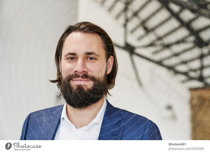 Portrait of smiling businessman smile Businessman Business man Businessmen Business men portrait portraits business people businesspeople business world