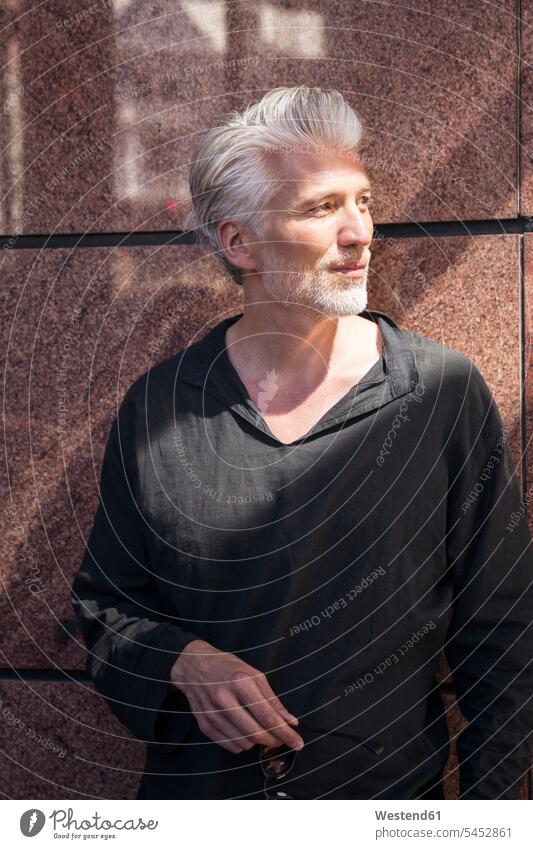 Portrait of a mature man, looking curious beard portrait portraits attention attentive paying attention watching observing observe men males people persons