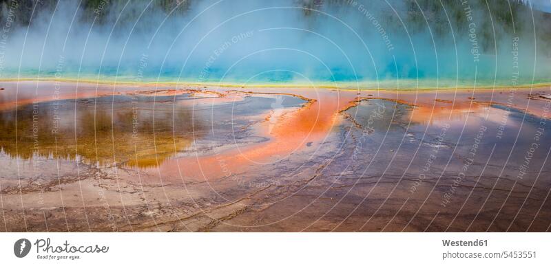 USA, Wyoming, Yellowstone National Park, Grand Prismatic Spring with puffy clouds geology geyser geysers geyser basin detail Extreme Close-Up details outdoors