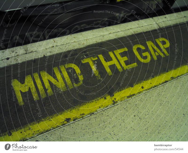 mind the gap Underground London Corner Railroad Yellow Dangerous Text train edge Caution Threat danger Characters London Underground Attention! Line