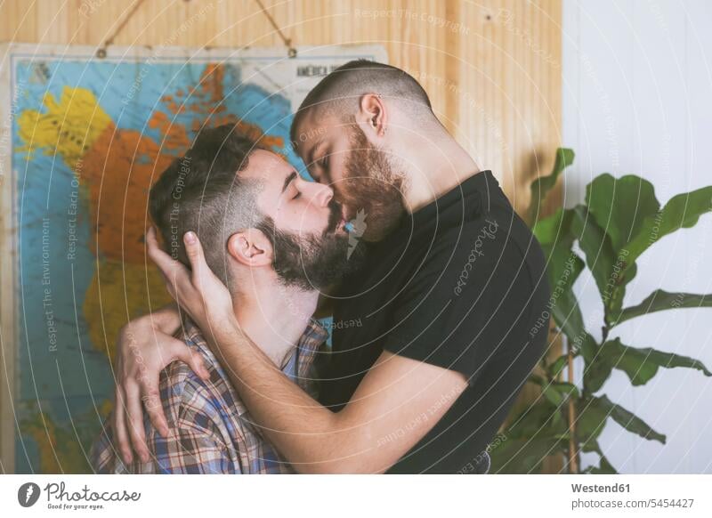 Tender kiss of gay couple in love homosexual queer same-sex homosexually gay men gay man homosexual men homosexual man kissing kisses twosomes partnership