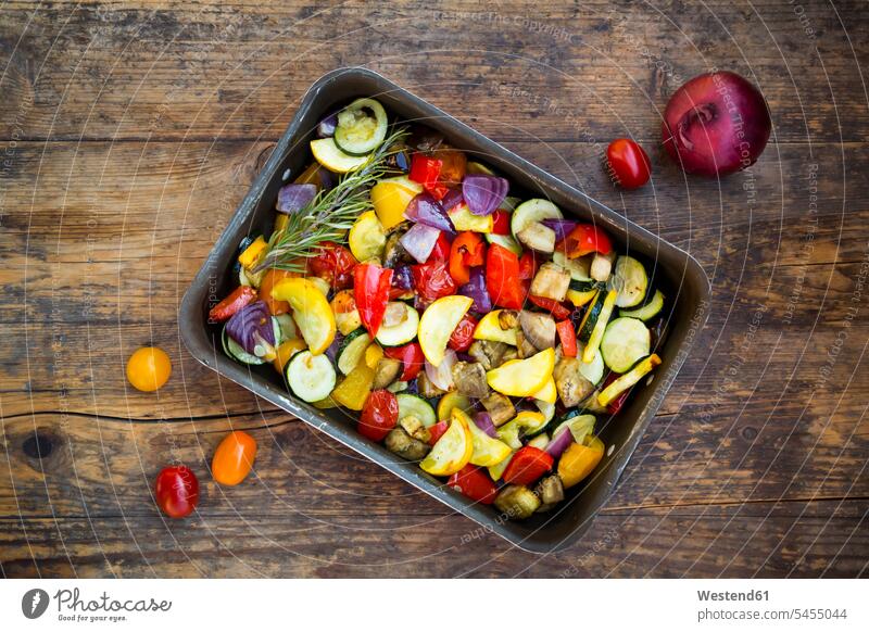 Mediterranean oven vegetables on roasting tray Courgette Zucchinis Courgettes green sqash Yellow Bell Pepper Yellow Bell Peppers food and drink Nutrition