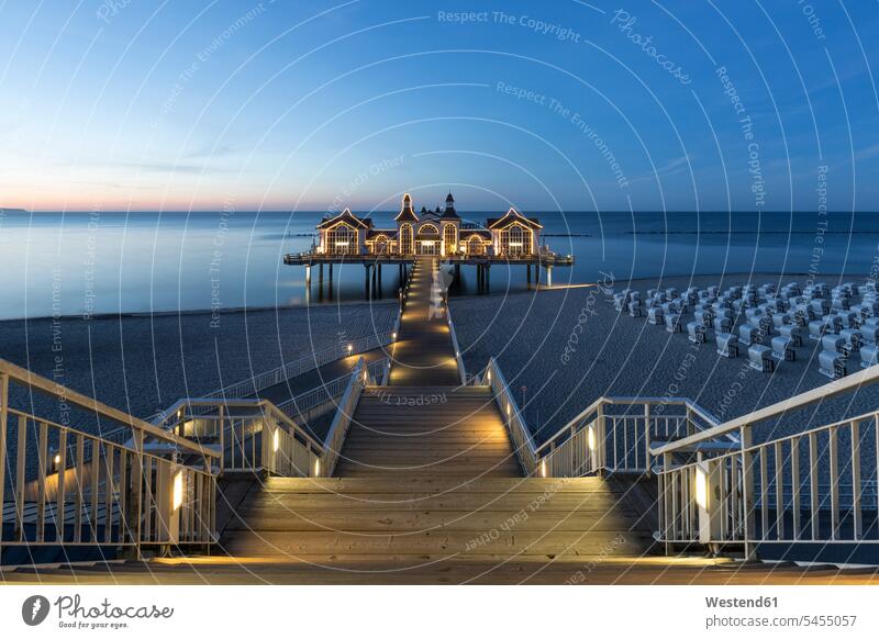 Germany, Ruegen, Sellin, view to sea bridge at sunset hooded beach chair roofed wicker beach chair Hooded Beach Chairs beach chairs footbridge foot bridges