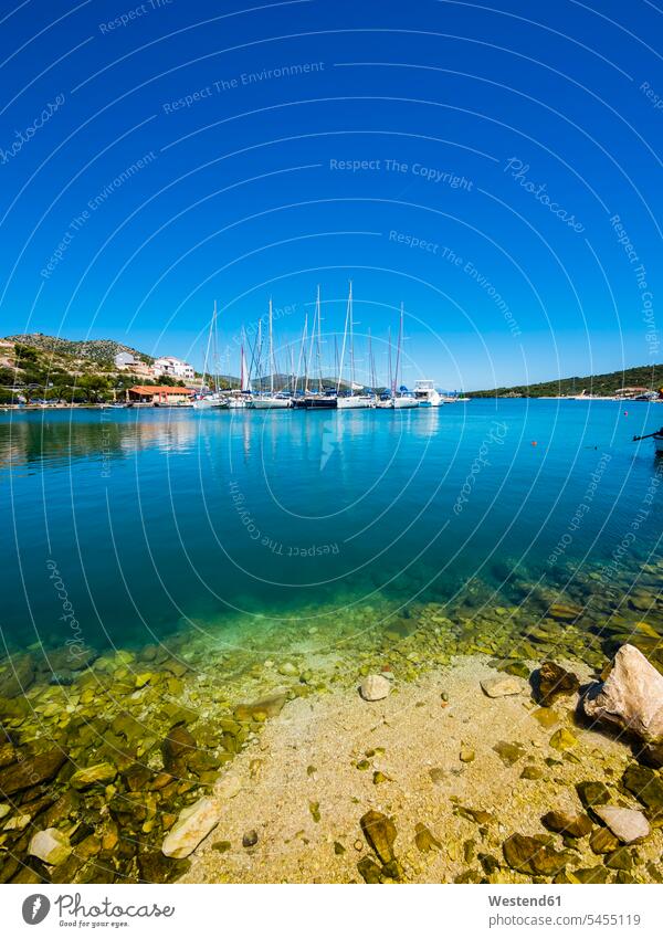 Croatia, Dalmatia, Adriatic Sea, Fishing village Marina, Bay with sailing boats coast coastline coast area Seacoast seaside blue sky blue skies clear sky marina