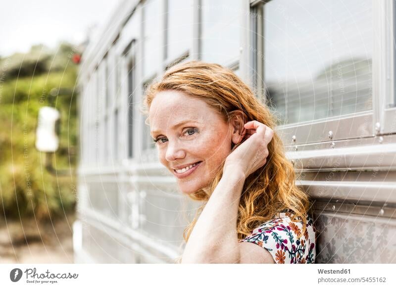 Portrait of smiling woman at an old bus smile females women portrait portraits Adults grown-ups grownups adult people persons human being humans human beings