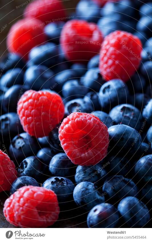 Blueberries and raspberries, close-up food and drink Nutrition Alimentation Food and Drinks Part Of partial view cropped overhead view from above top view