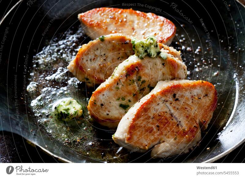 Fillet of turkey with herb butter in pan food and drink Nutrition Alimentation Food and Drinks frying preparing Food Preparation preparing food seasoned