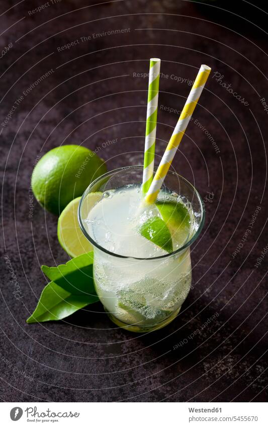 Fruit spritzer of limes in a glass with drinking straws nobody soft drink refreshing drink soft drinks refreshing drinks Leaf Leaves Refreshment green organic