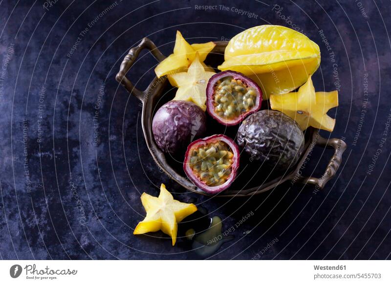 Starfruit and passion fruits Star Fruit Carambolas Star Fruits Averrhoa carambola yellow Bowl Bowls studio shot studio shots studio photograph