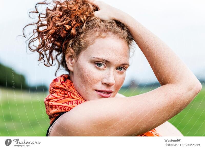 Portrait of freckled young woman with curly red hair Smartphone iPhone Smartphones females women curly hair curls portrait portraits mobile phone mobiles