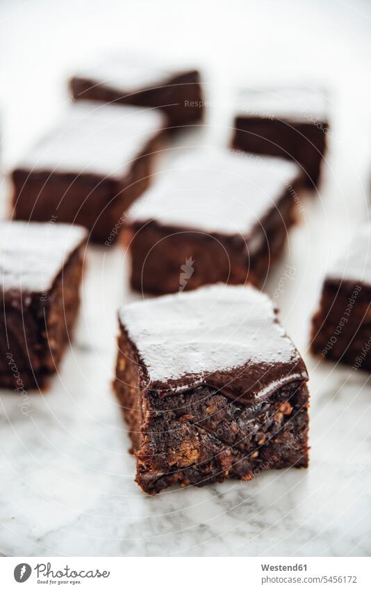 Healthy brownies made of dates, sweet potato, cacao, maple syrup, oat flakes, almond flour and coconut oil cube cubes healthy eating nutrition temptation