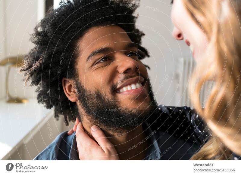 Close up of man smiling at woman home at home Love loving couple twosomes partnership couples positive Emotion Feeling Feelings Sentiments Emotions emotional
