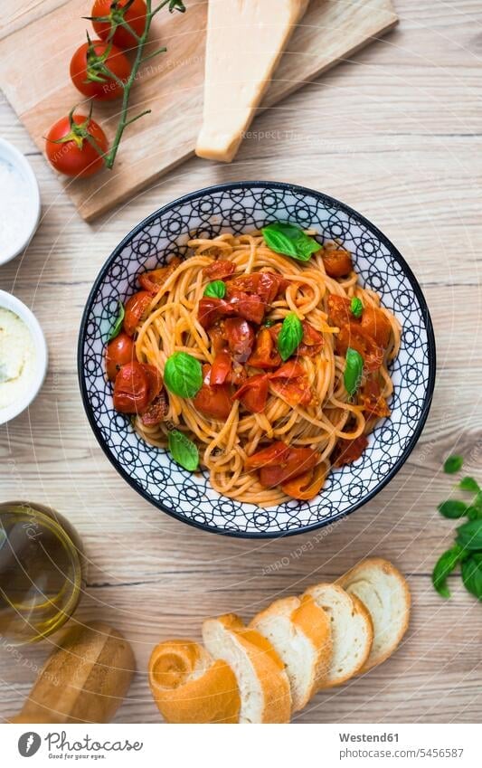 Spaghetti with cherry tomatoes and basil in a bowl Bowl Bowls healthy eating nutrition prepared parmesan Parmesan Cheese garnished Italian Food Italian cuisine