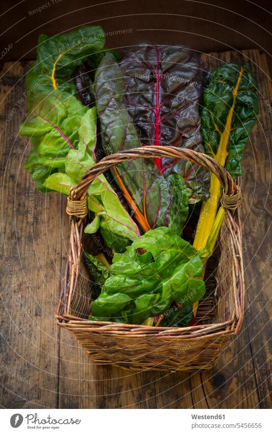 Organic mangold in basket organic nobody harvested lettuce leaf lettuce leaves wickerbasket wicker basket wickerbaskets wicker baskets multicolored