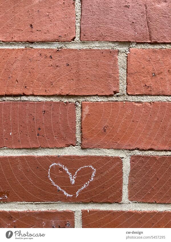 Heart with chalk on a brick wall Chalk Red Gray