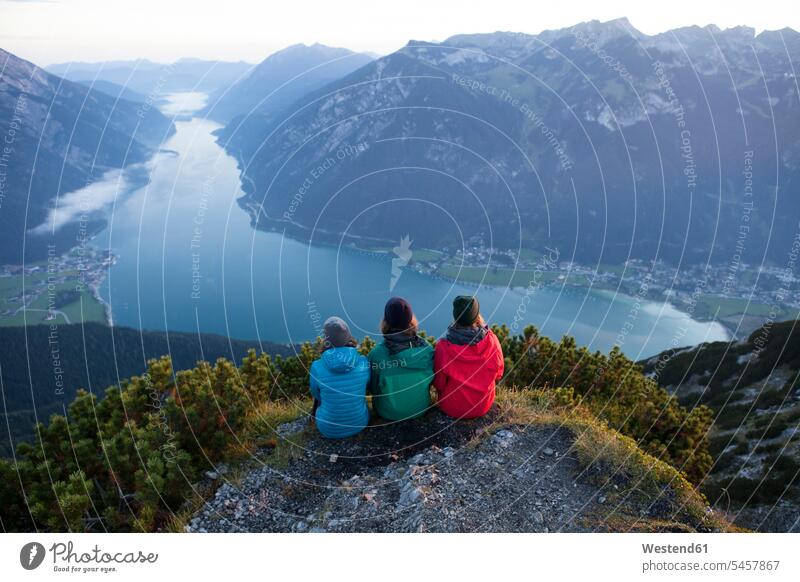 Austria, Tyrol, three hikers enjoying the view on Achensee wanderers View Vista Look-Out outlook indulgence enjoyment savoring indulging hiking pleasure