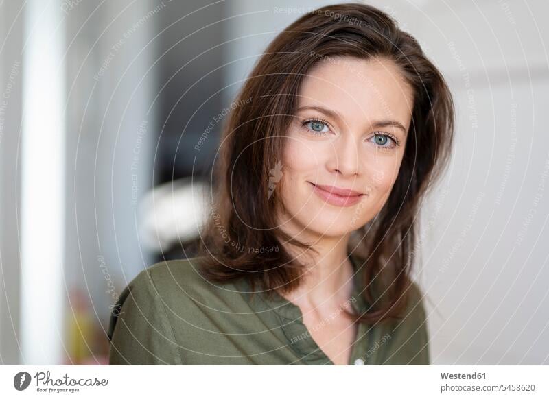 Portrait of smiling woman with brown hair smile females women portrait portraits Adults grown-ups grownups adult people persons human being humans human beings