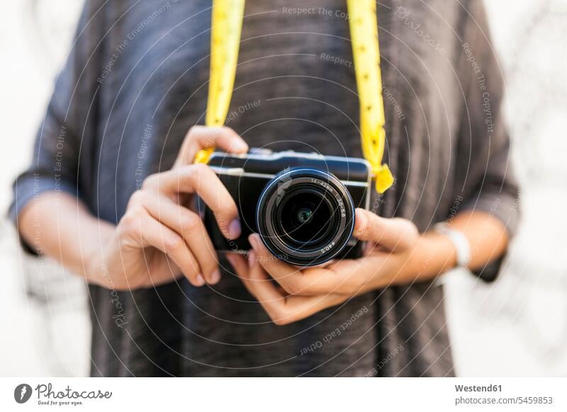 Close-up of woman with camera cameras females women Adults grown-ups grownups adult people persons human being humans human beings motif motive lens lenses