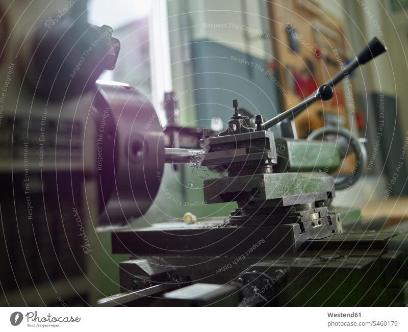 Close-up of a lathe devices machines machine tools lathes making industrial industries Occupation Work metals factories factory plants fabrication productions