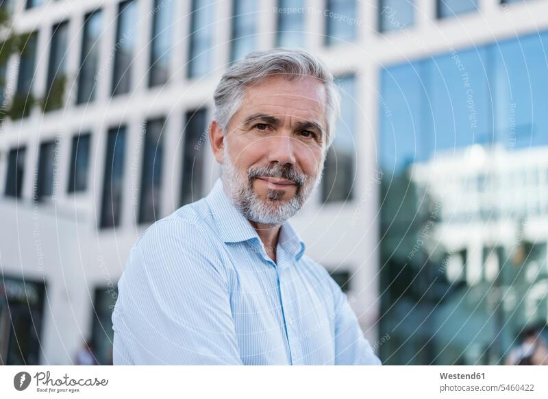 Portrait of confident mature businessman in the city human human being human beings humans person persons caucasian appearance caucasian ethnicity european 1