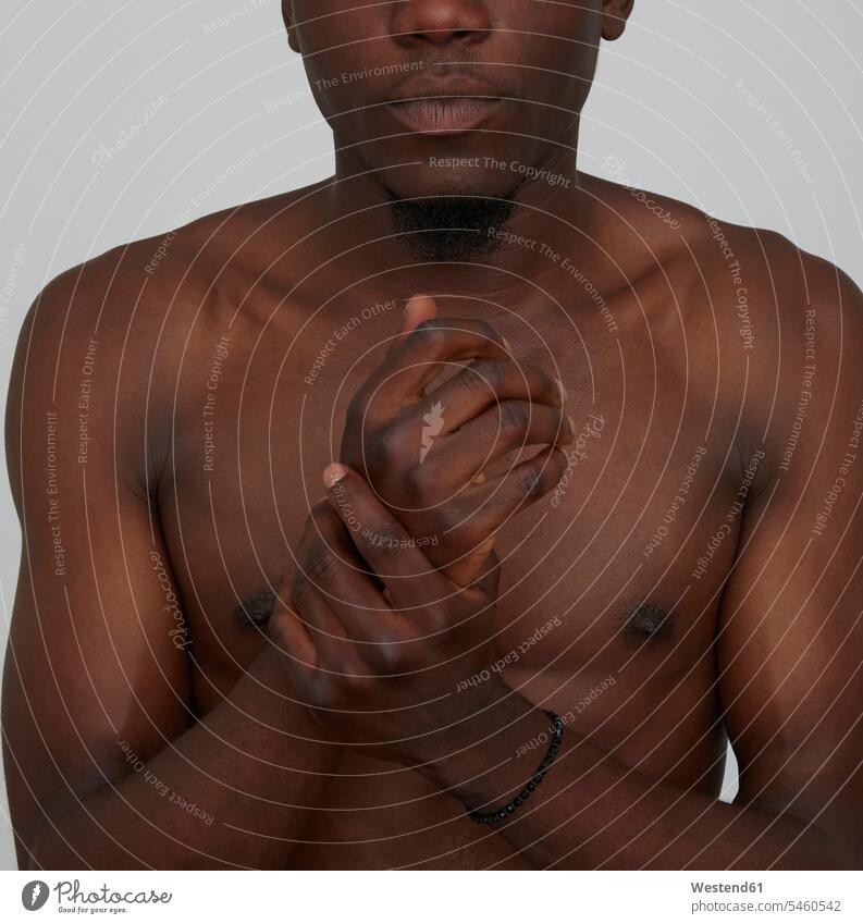 Portrait of African man, close-up of hands human human being human beings humans person persons black black ethnicity coloured 1 one person only only one person