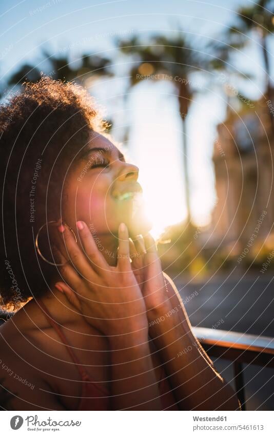 USA, Nevada, Las Vegas, portrait of happy young woman in the city happiness town cities towns females women portraits outdoors outdoor shots location shot