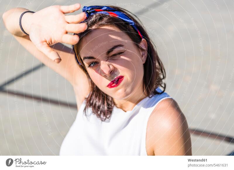 Portrait of beautiful young woman shielding her eyes portrait portraits females women Adults grown-ups grownups adult people persons human being humans