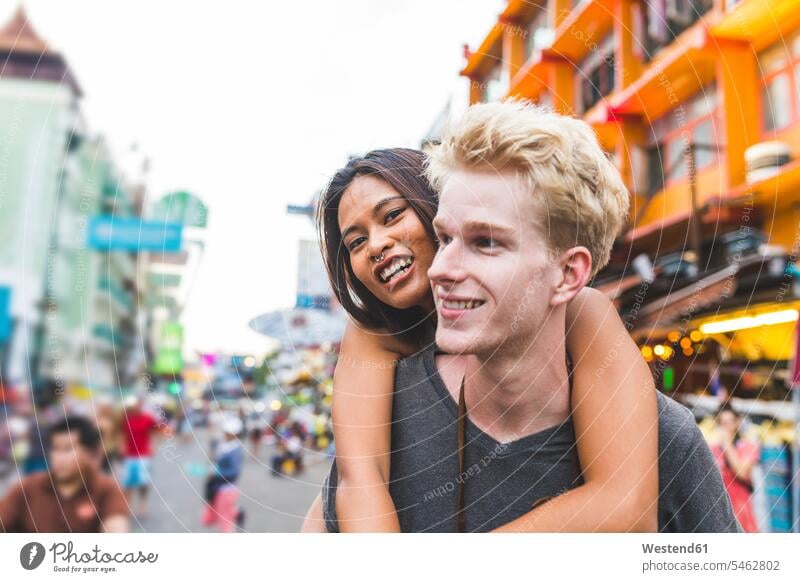 Thailand, Bangkok, Khao San Road, portrait of happy friends portraits happiness city town cities towns outdoors outdoor shots location shot location shots