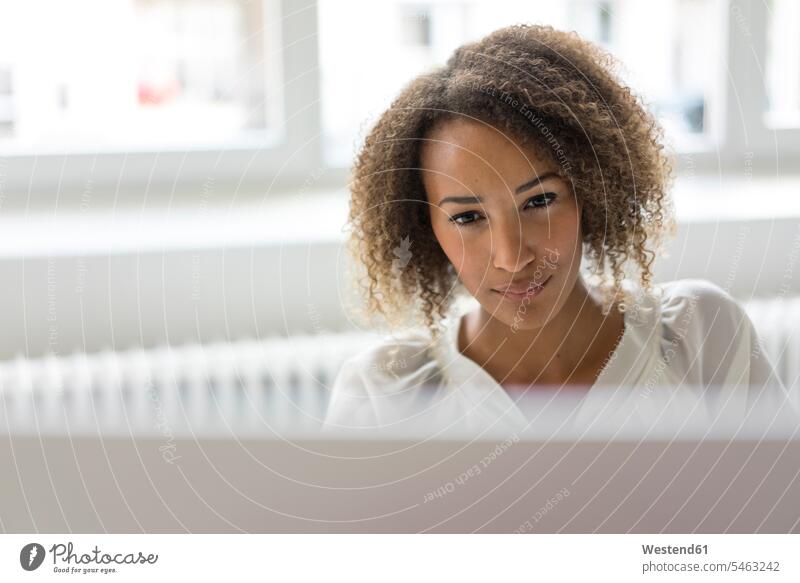 Portrait of smiling young freelancer working at desk Occupation Work job jobs profession professional occupation business life business world business person