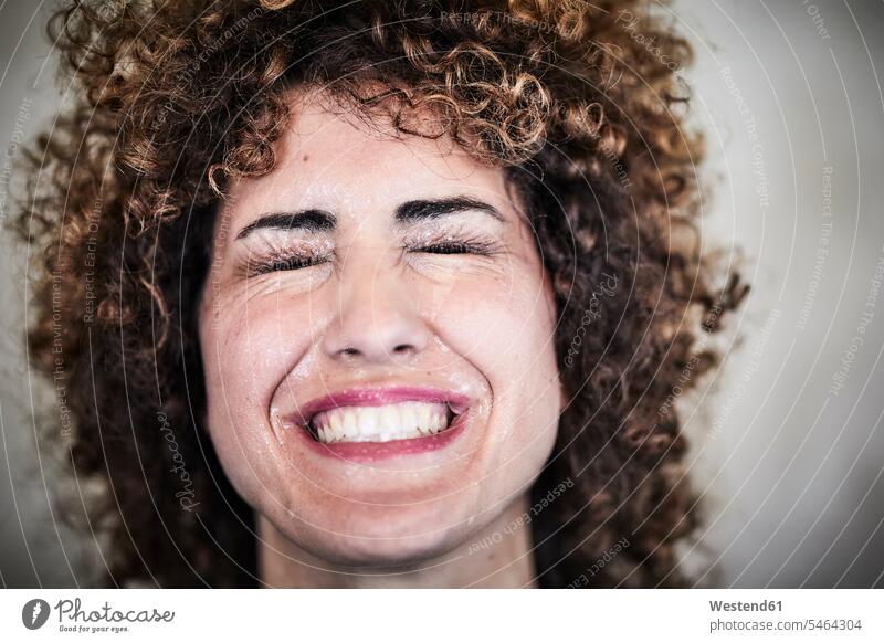 Portrait of sweating woman with curly hair curls curled perspiration portrait portraits females women people persons human being humans human beings Adults